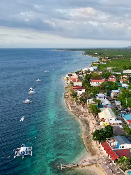 Drone shot of the snorkelers at Moalboal Beach, The Philippines