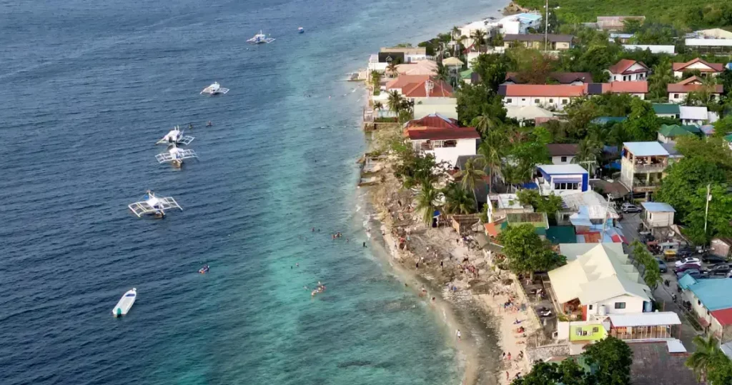 Drone shot of the snorkelers at Moalboal Beach, The Philippines